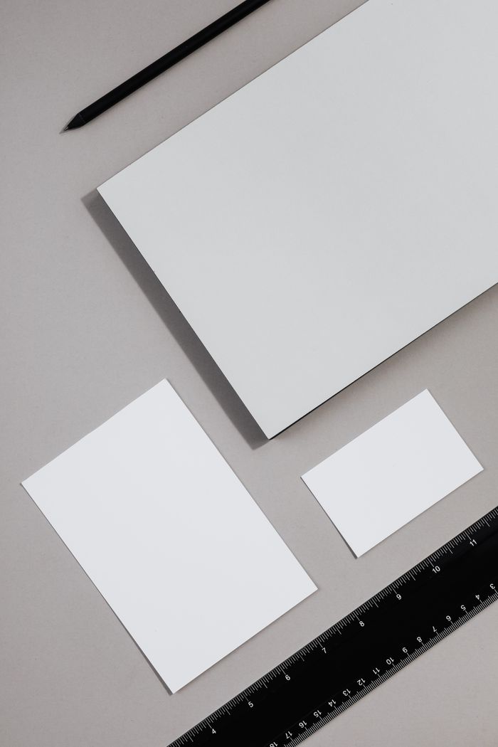 services-02 Top view of blank stationery items on a neutral background, perfect for design mockups.